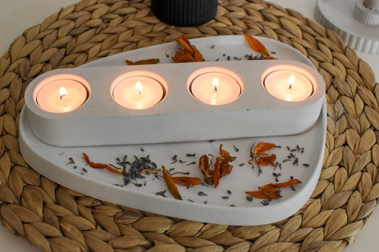 ovaler Teelichthalter aus Beton in Ice-Grau für vier Teelichter